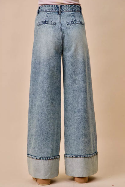 Mid-rise plated wide-leg denim jeans by Trendsi, showcasing the stylish cut and detailing of the trendy denim pants.