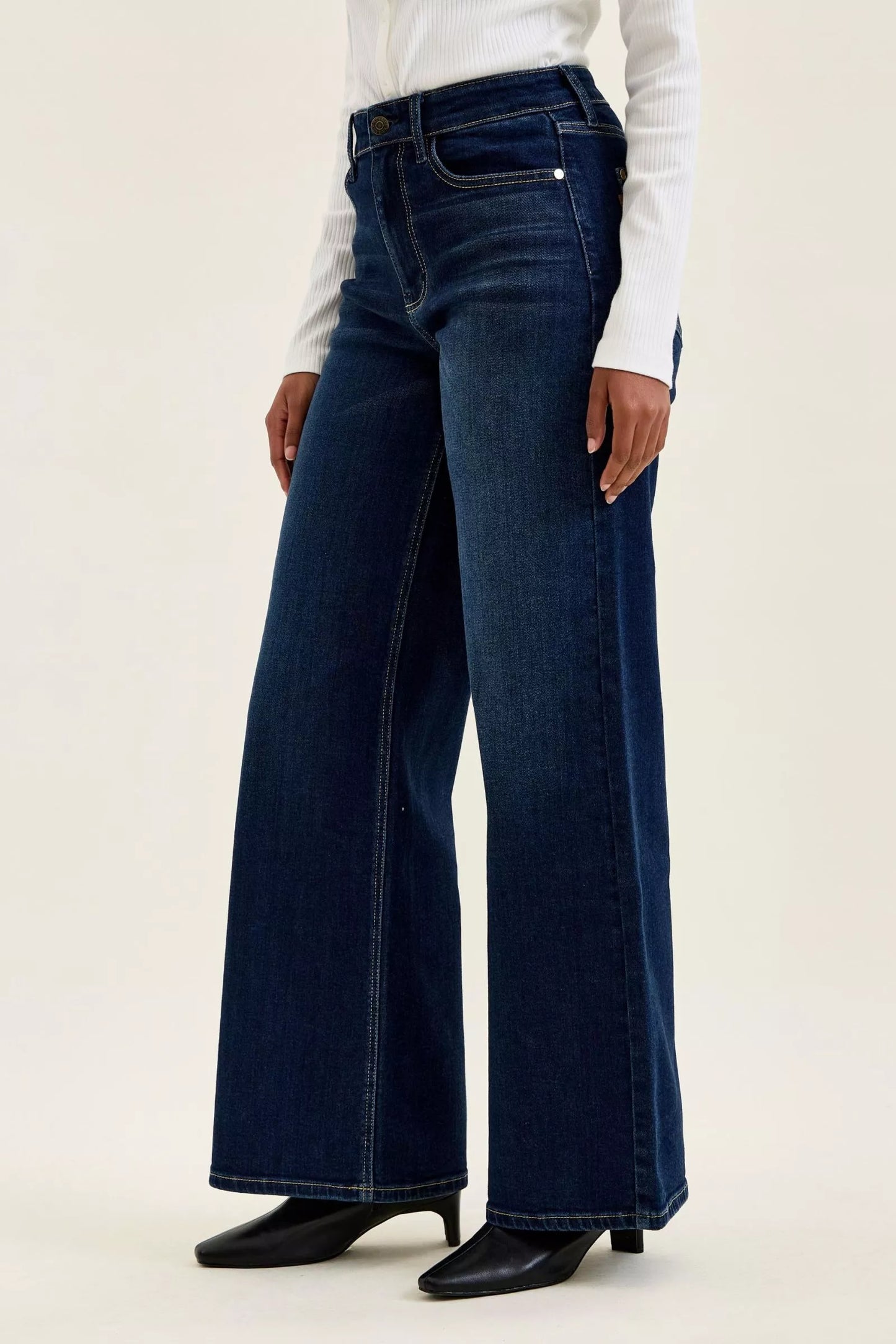 Dark wash Judy Blue high-waisted wide-leg jeans with classic five-pocket design and relaxed fit, perfect for casual wear.