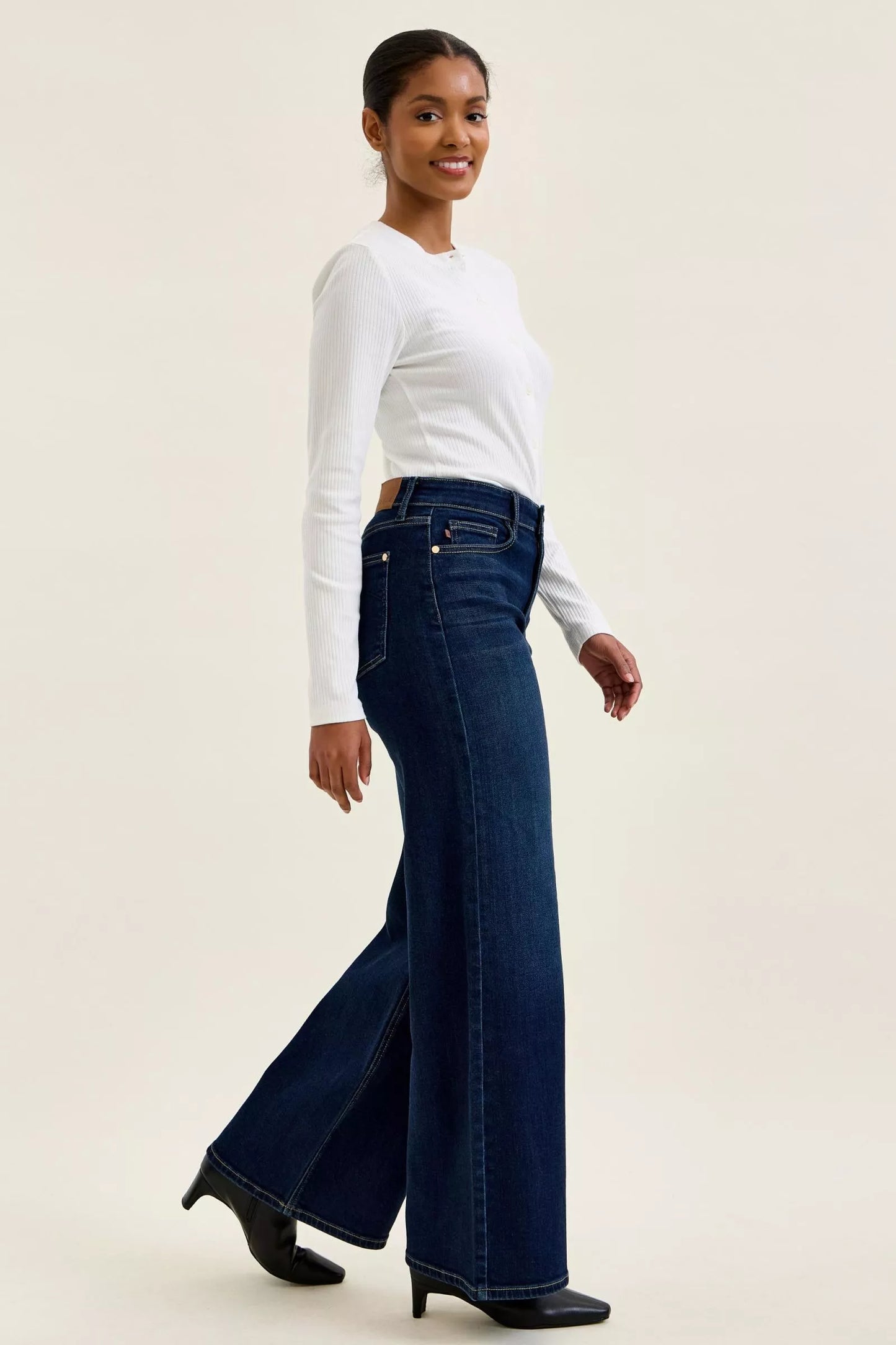 Dark wash Judy Blue high-waisted wide-leg jeans with classic fit and stylish flair, perfect for casual or chic outfits.