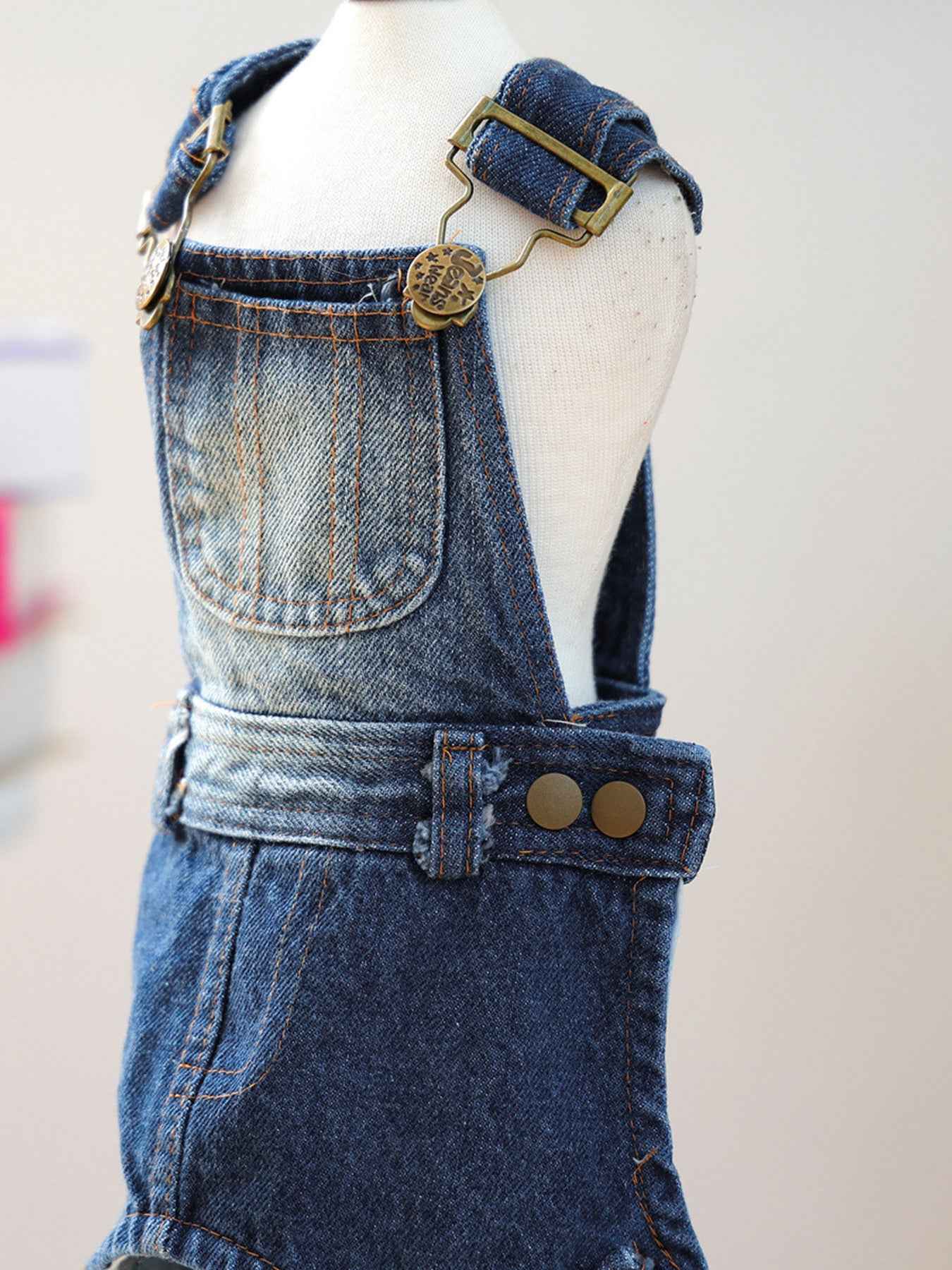 Stylish denim dog overalls from Trendsi, featuring a trendy look and comfortable fit for pets.
