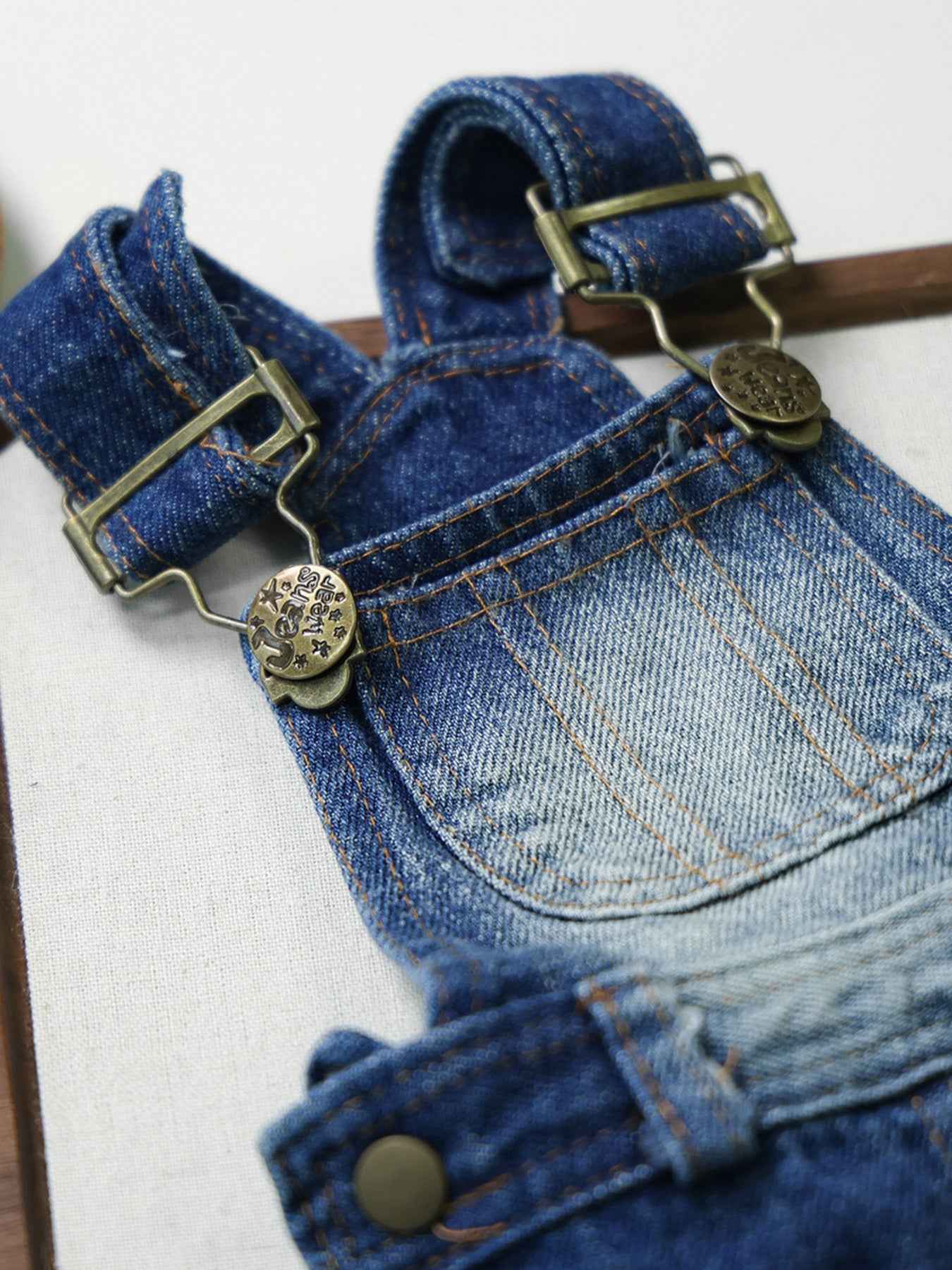 Trendsi denim dog overalls for pets, stylish and trendy dog clothing, one-size fits small to medium dogs, casual denim fashion for pets.