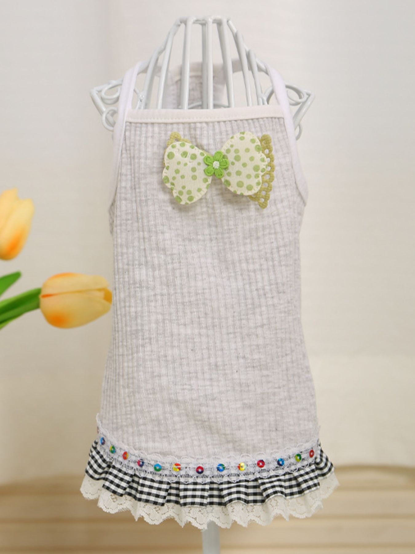 Tangerine-colored Bowknot Ruffled Hem Pet Top for dogs, featuring a cute bowknot and ruffled hem, from Trendsi dog clothing collection.