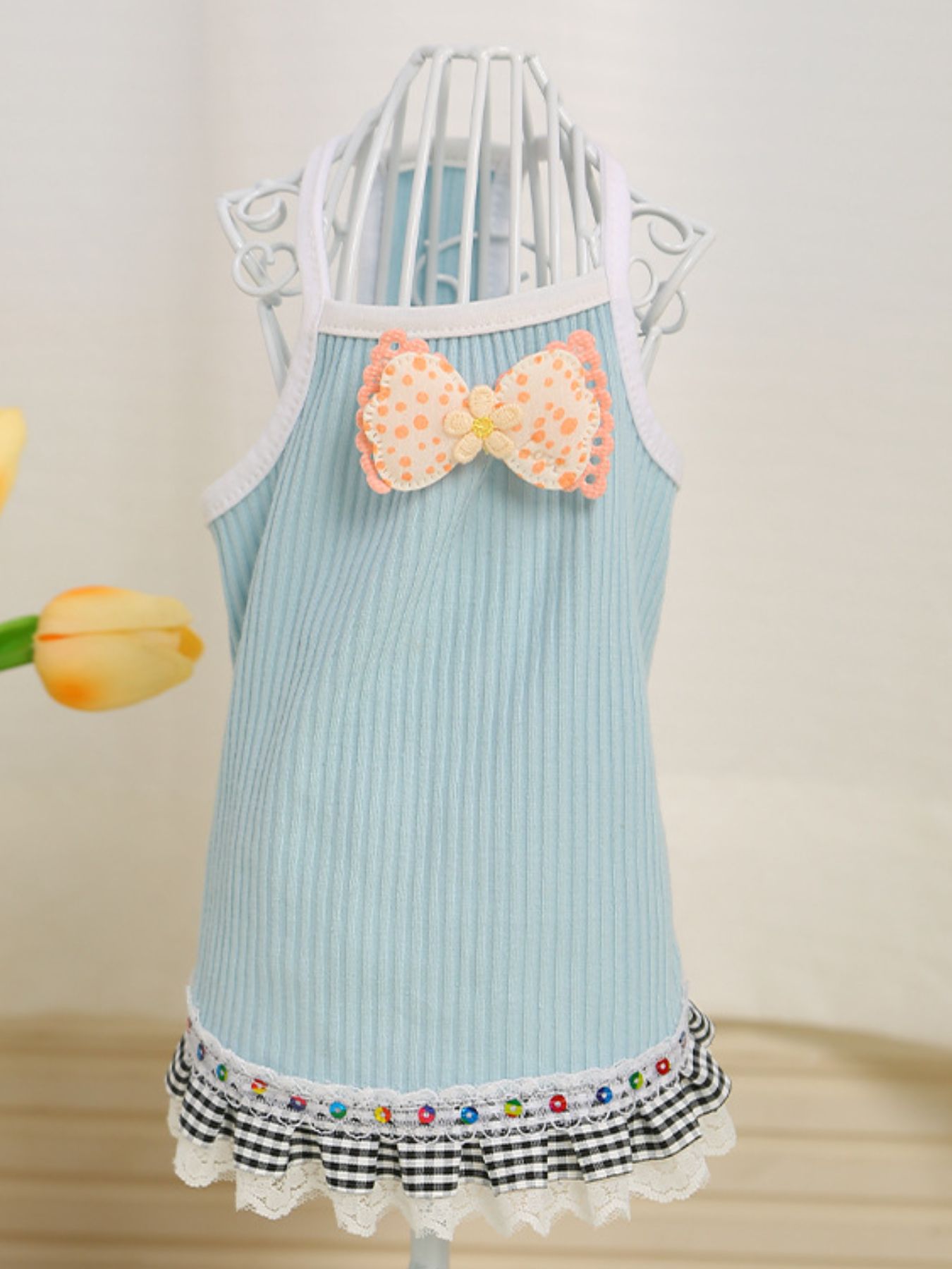 Orange dog top with bowknot and ruffled hem, Trendsi pet clothing, XS size, stylish and comfortable for small dogs.