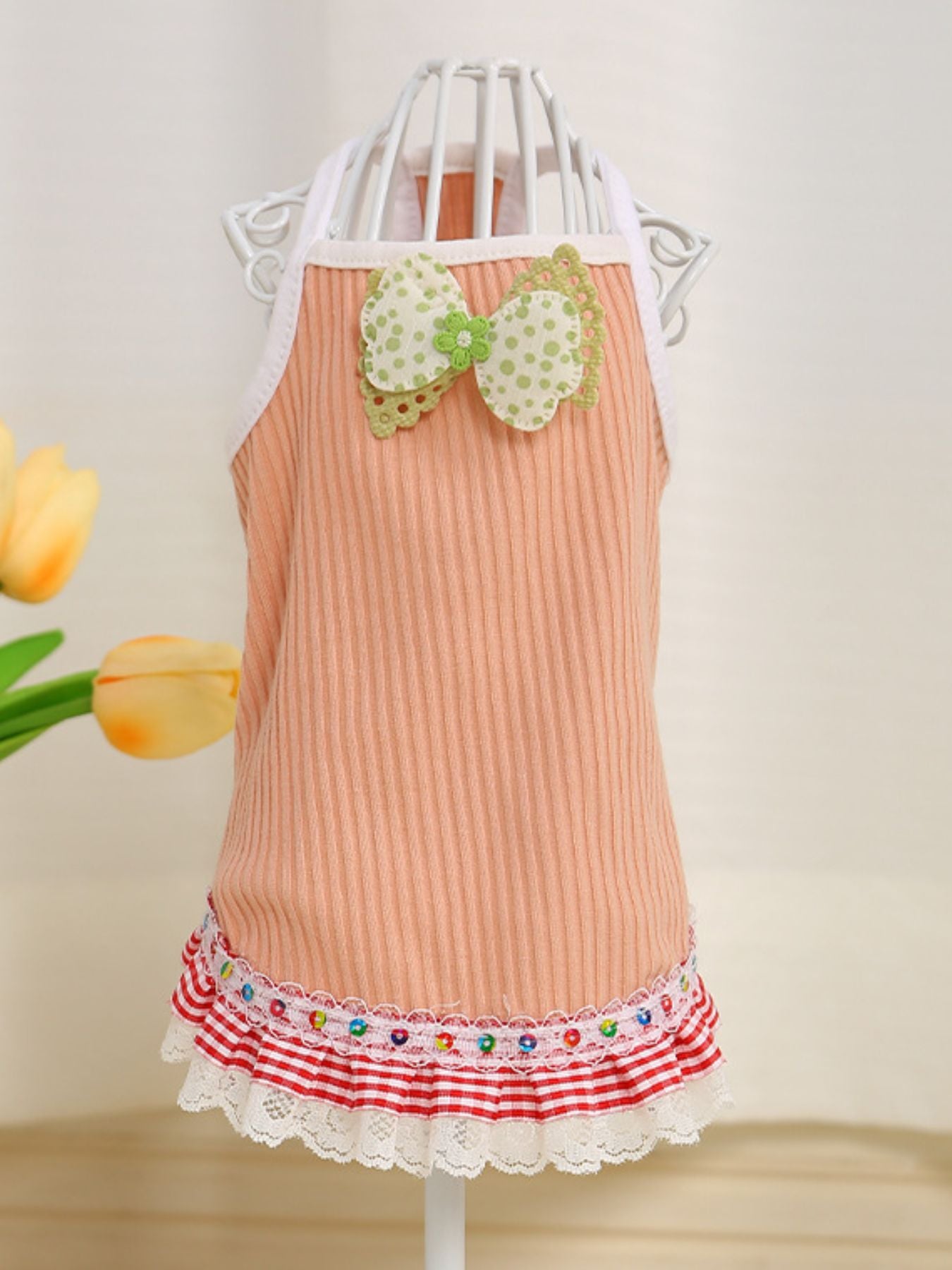 Tangerine dog top with bowknot and ruffled hem, Trendsi pet clothing for small dogs, XS size, stylish and comfortable.