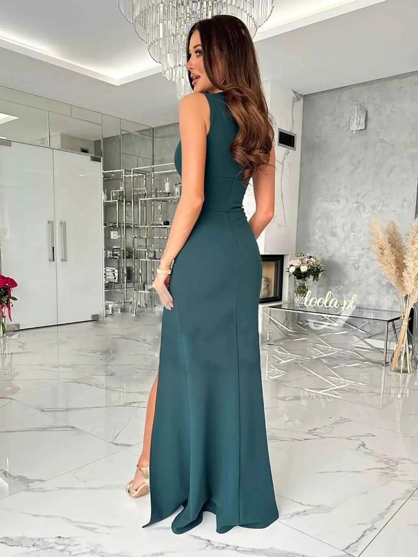 Dust Storm sleeveless high slit maxi dress by Trendsi, featuring a chic, flowing design perfect for any occasion.