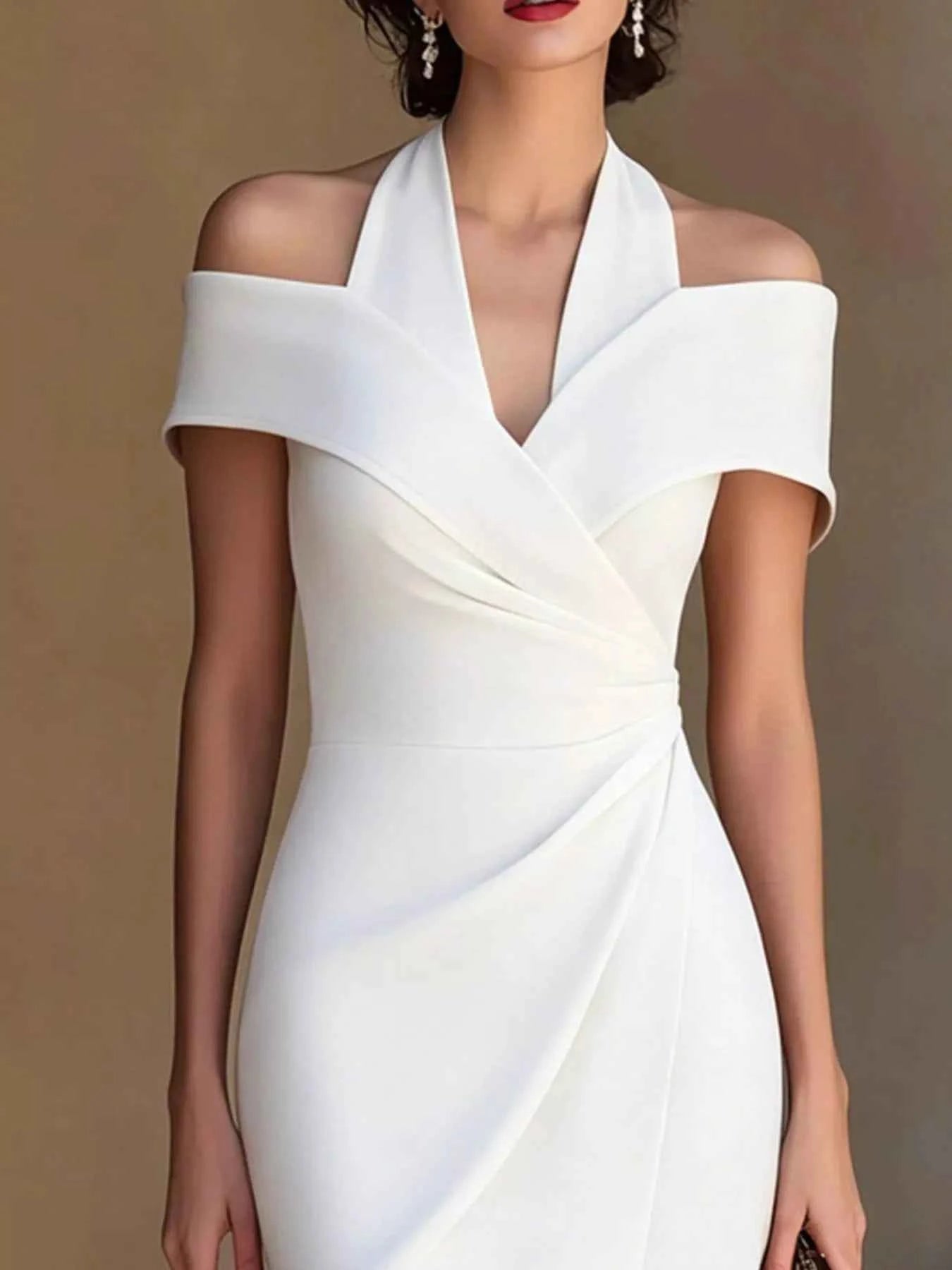 White ruched asymmetrical midi dress by Trendsi, featuring a flattering fit and elegant design for stylish occasions.