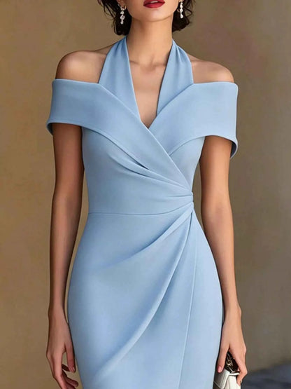 White ruched asymmetrical midi dress by Trendsi featuring a flattering fit and elegant design, perfect for sophisticated occasions.