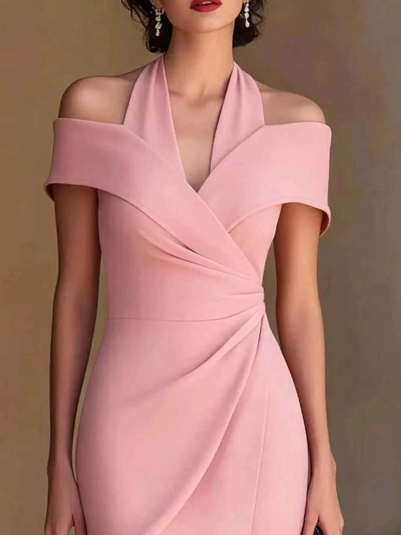 White ruched asymmetrical midi dress from Trendsi featuring a flattering fit and elegant design perfect for stylish occasions.