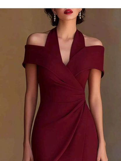 White ruched asymmetrical midi dress by Trendsi featuring a flattering fit and elegant design, perfect for stylish occasions.
