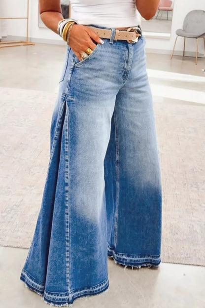 Dusty blue flare leg jeans with side seam gathering from Trendsi, featuring a high-waisted fit and wide flare leg design.