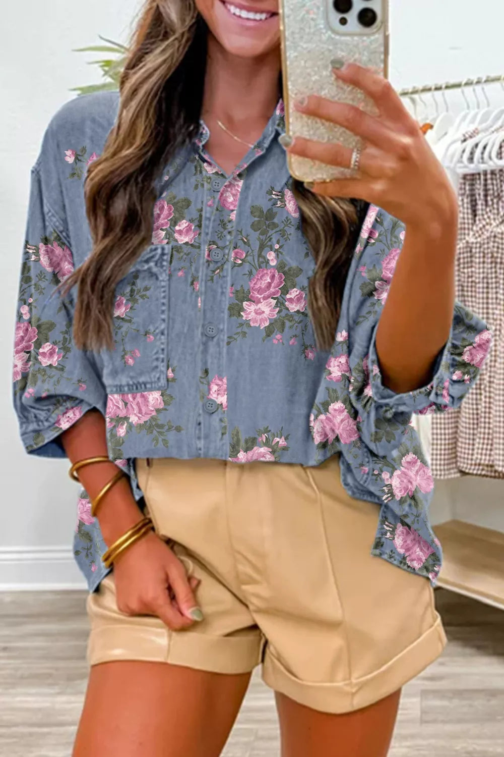 Dusty blue floral print denim shirt by Trendsi, featuring button-up front and long sleeves, casual and stylish for everyday wear.