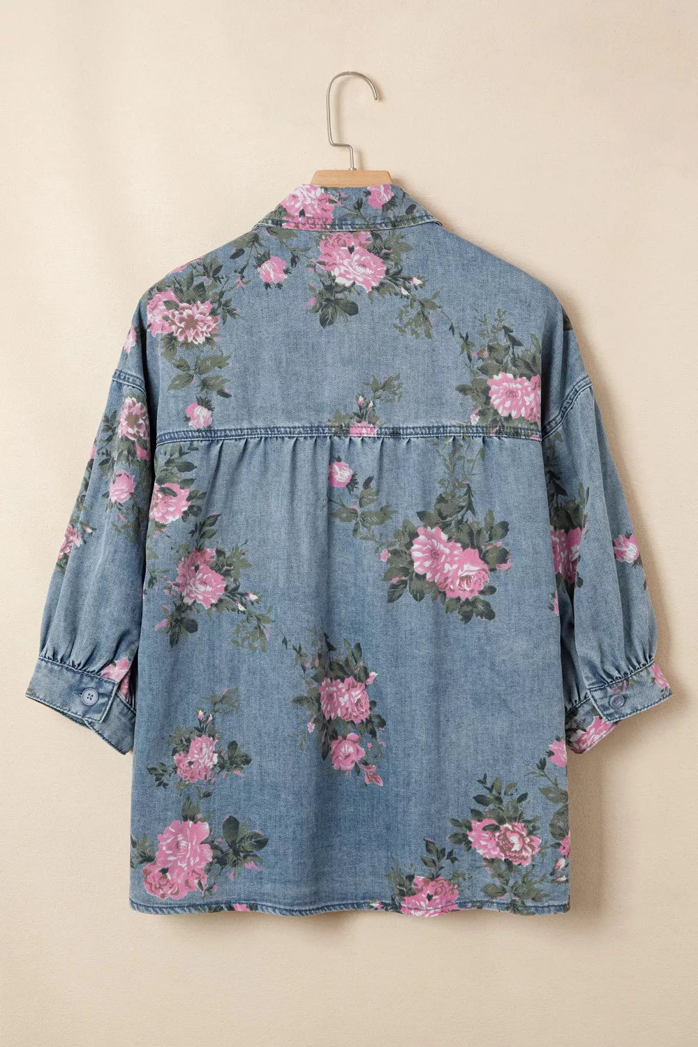 Dusty blue floral print denim shirt by Trendsi, featuring a button-up design and long sleeves, casual and stylish for everyday wear.