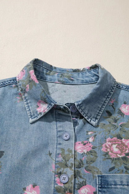 Dusty blue floral print denim shirt by Trendsi, front view showcasing button-up design and vibrant floral pattern.