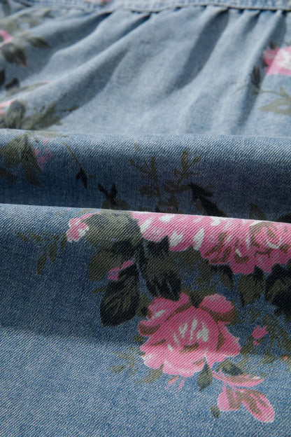 Dusty blue floral print denim shirt by Trendsi, featuring button-up front and long sleeves with a stylish, casual design.