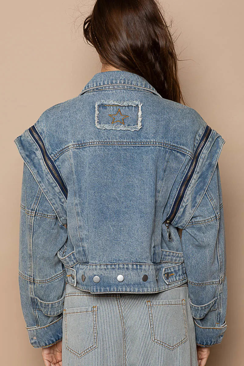 Dusty blue POL cropped denim jacket by Trendsi with functional zipper detail, showcasing a stylish, fitted design and classic denim texture.