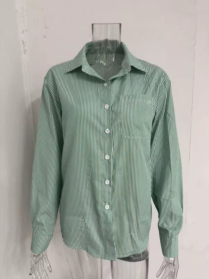 Striped button-down relaxed fit shirt by Trendsi, featuring a casual style with vertical stripes and a classic collar.