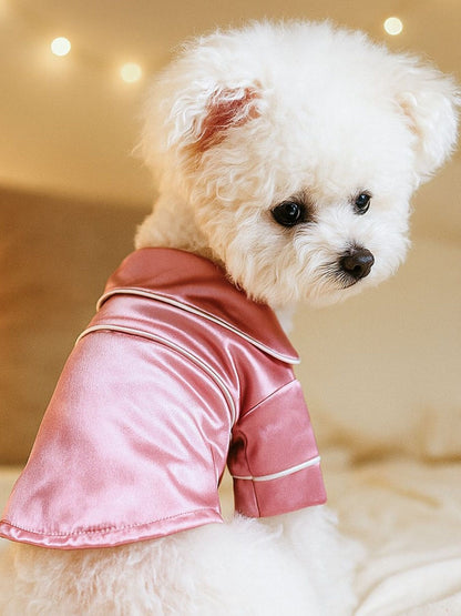 Dusty pink satin pet pajamas with contrast piping, featuring a comfortable fit and stylish design by Trendsi.