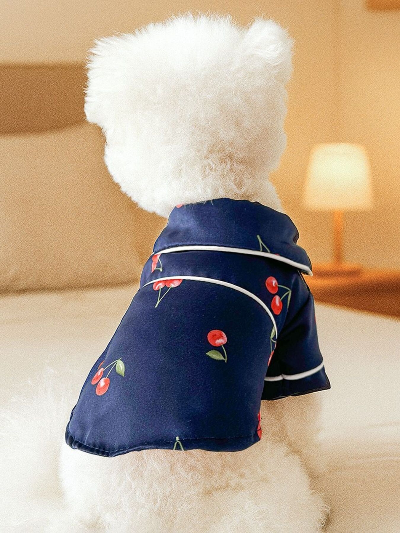 Dusty pink satin pet pajamas with contrast piping, featuring a comfortable fit and stylish design for pets.
