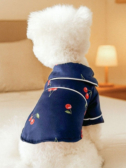 Dusty pink satin pet pajamas with contrast piping, featuring a comfortable fit and stylish design for pets.