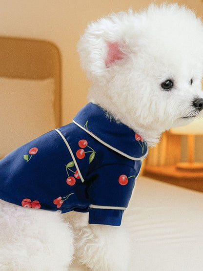 Dusty pink satin pet pajamas with contrast piping, featuring a comfortable fit and stylish details for pets.
