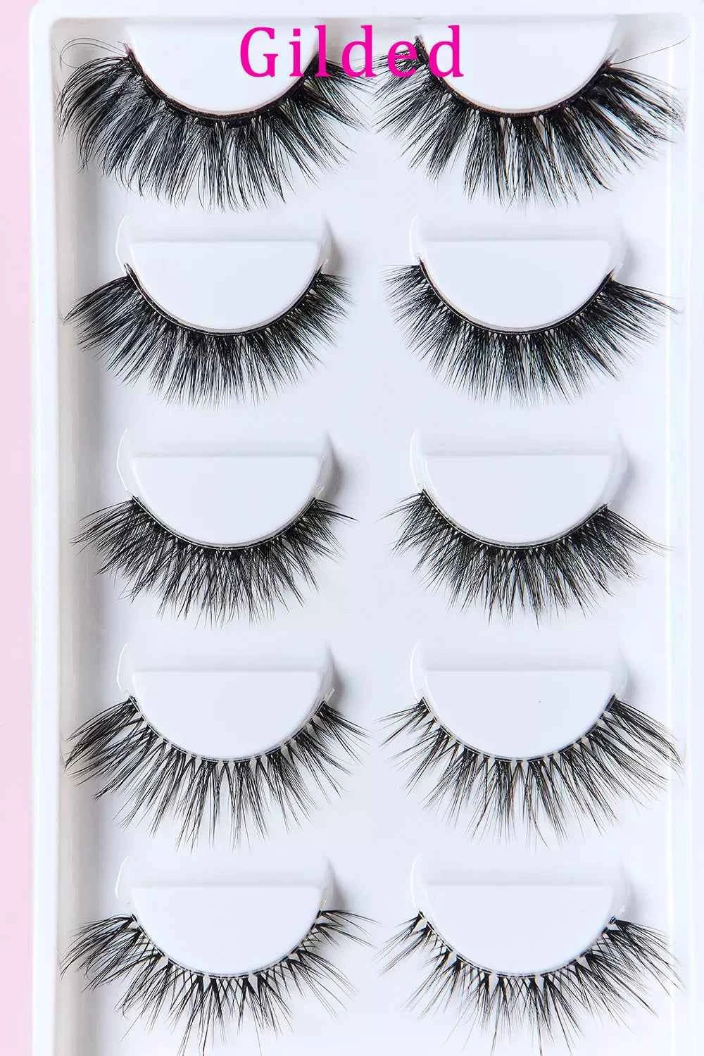 Set of five lightweight, reusable faux mink eyelashes by Trendsi, displayed in clear packaging with natural-looking lash styles.