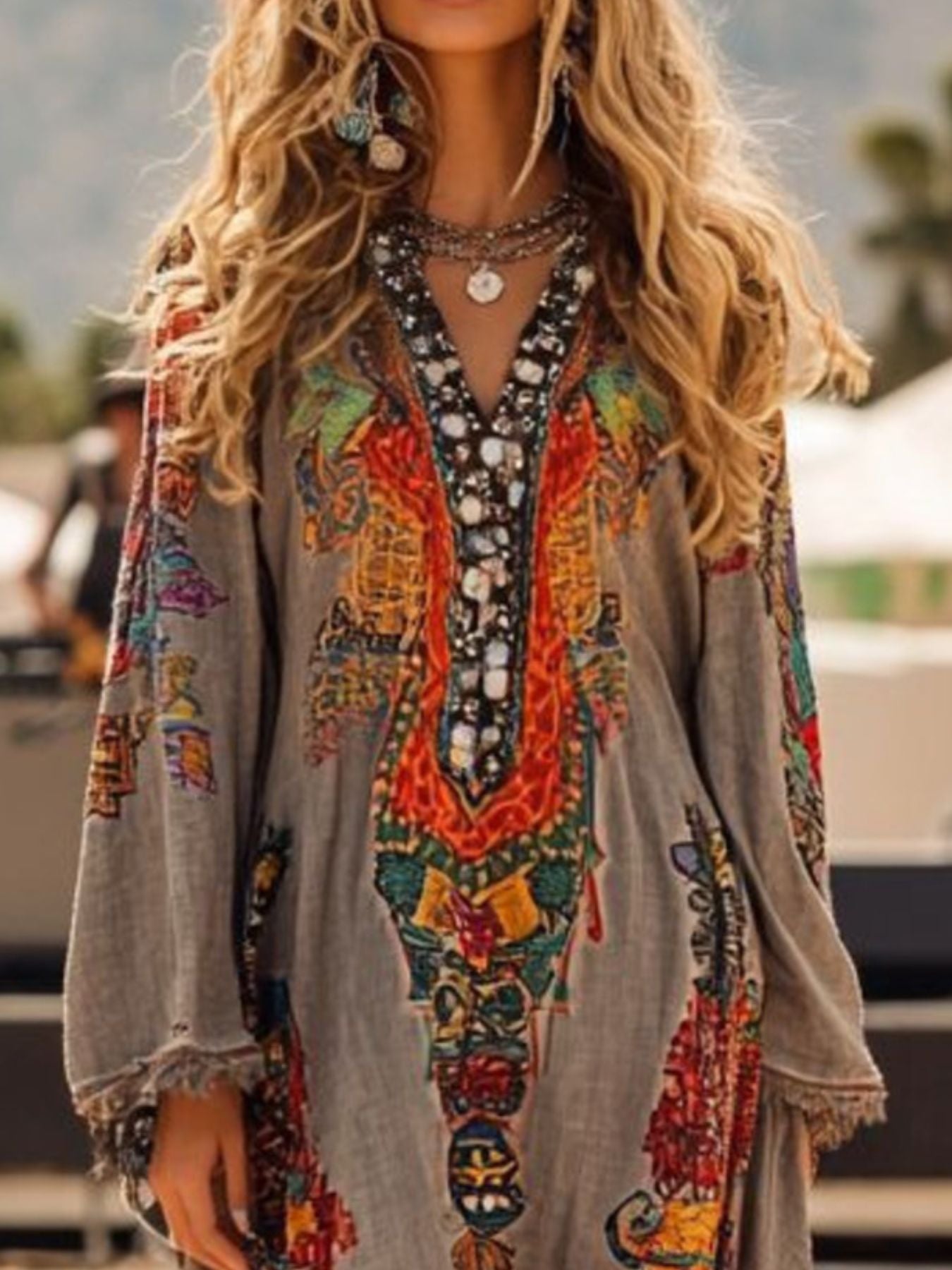 Gray Fringe Hem Notched Long Sleeve Dress by Trendsi, featuring a stylish fringe hem and a notched neckline.