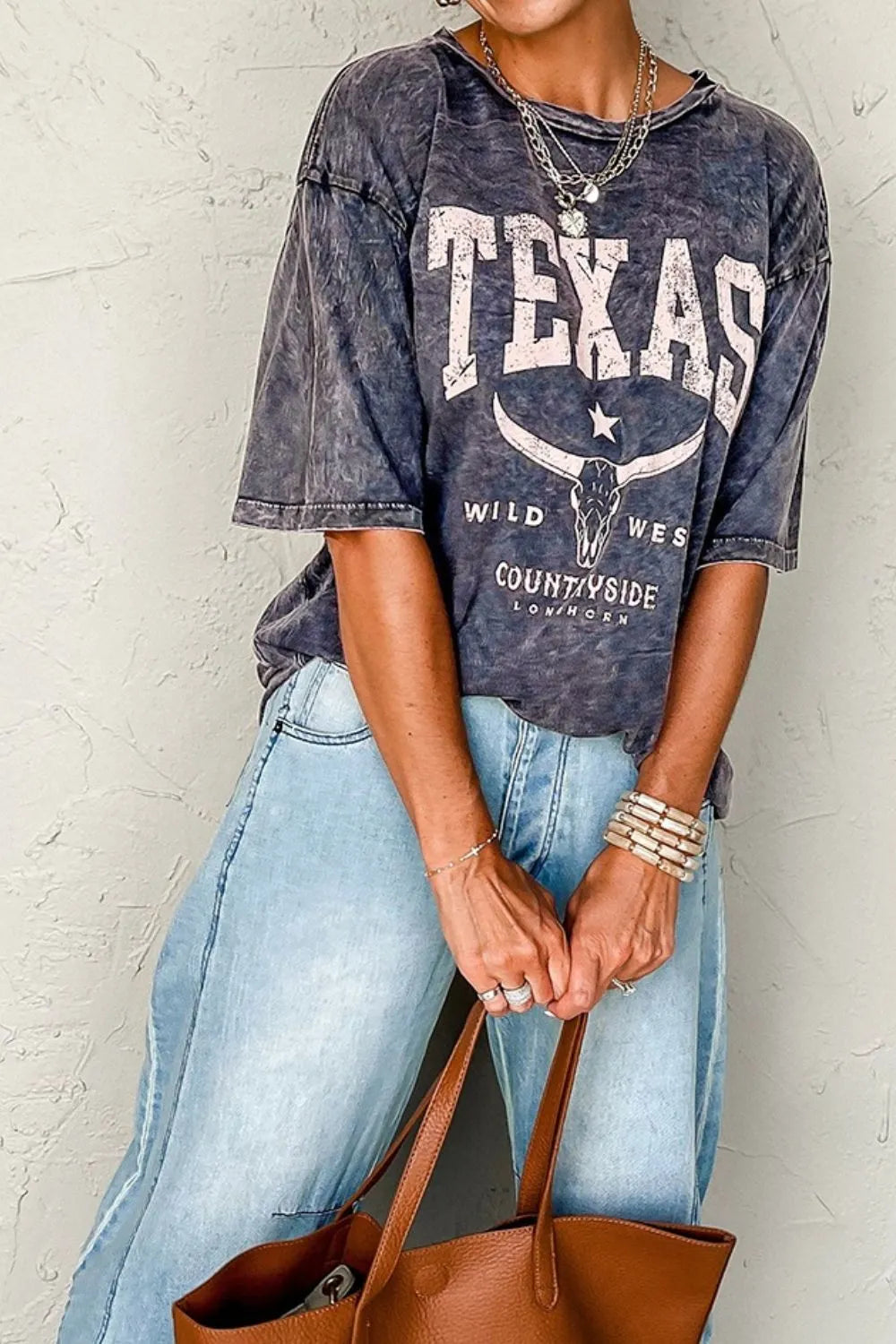 Oversized Texas Steer Head graphic mineral wash T-shirt from Trendsi, featuring a bold steer design on soft, vintage-style fabric.