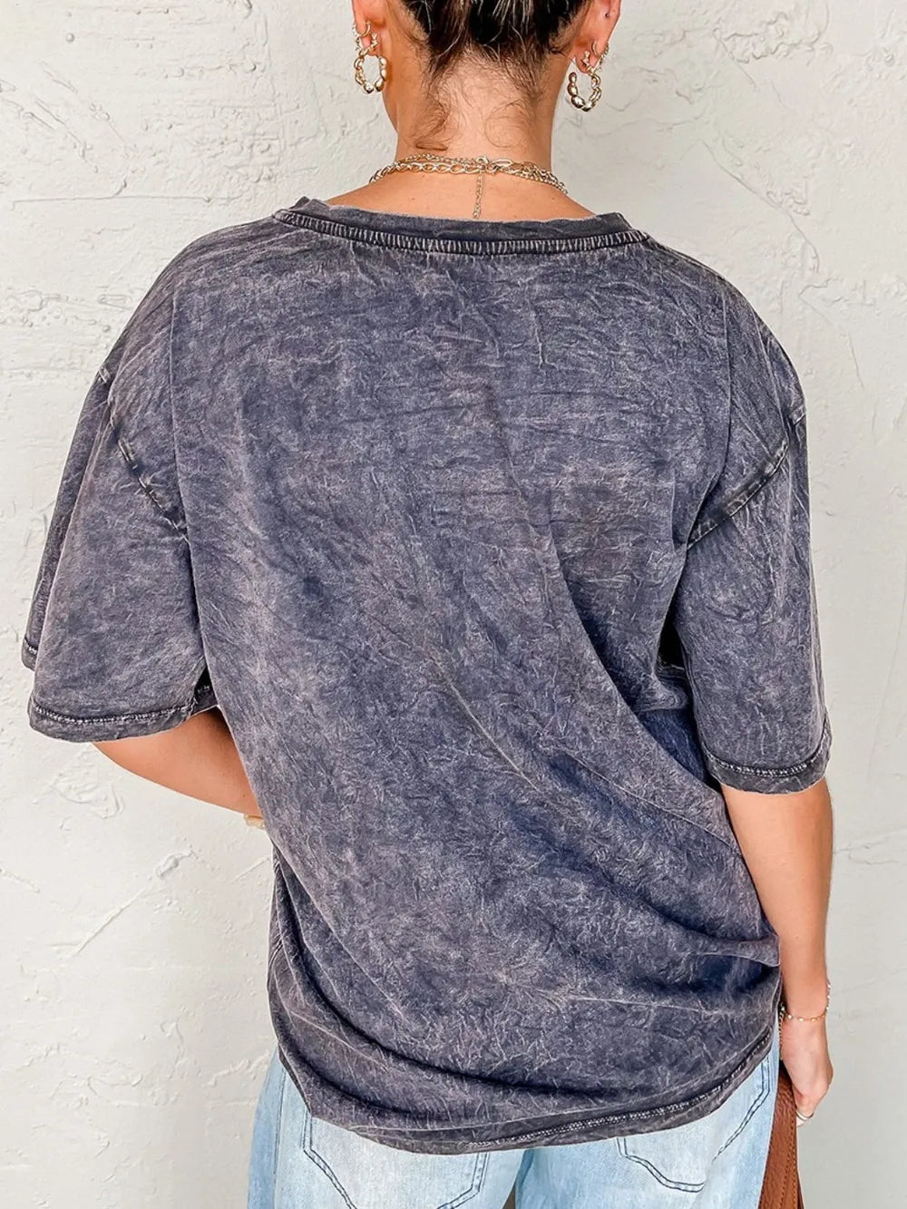 Oversized TEXAS Steer Head graphic mineral wash T-shirt by Trendsi, showing a bold steer head design on soft, vintage-style fabric.