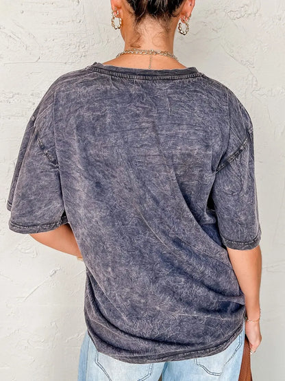 Oversized TEXAS Steer Head graphic mineral wash T-shirt by Trendsi, showing a bold steer head design on soft, vintage-style fabric.