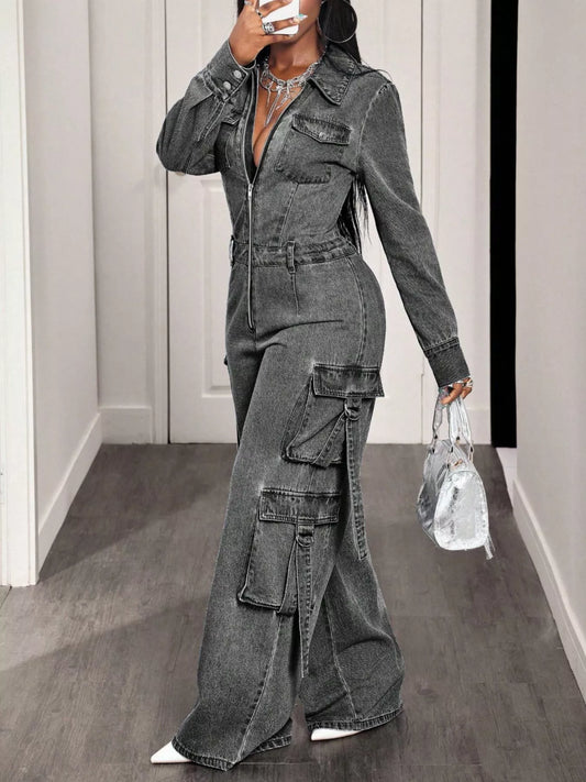 Light blue denim jumpsuit with zip front, wide-leg cargo style, featuring pockets and adjustable waist for a trendy look.