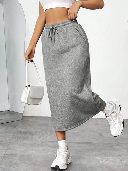 Trendsi slit drawstring midi skirt in lightweight fabric, featuring a high waist and side slit for a stylish, casual look.