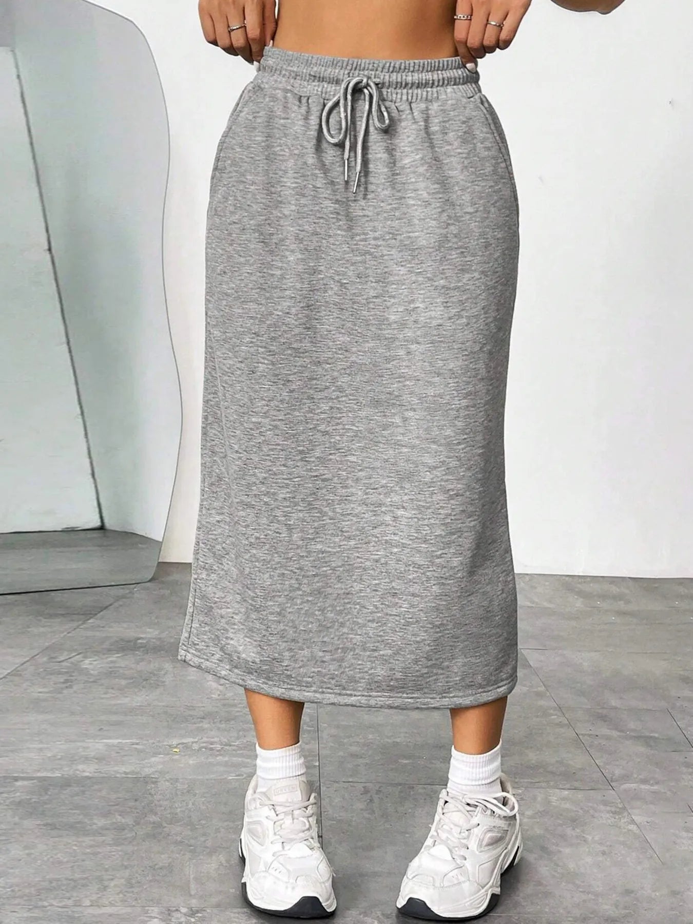 Trendsi slit drawstring midi skirt in lightweight fabric with a high slit and adjustable waist tie, styled for a casual look