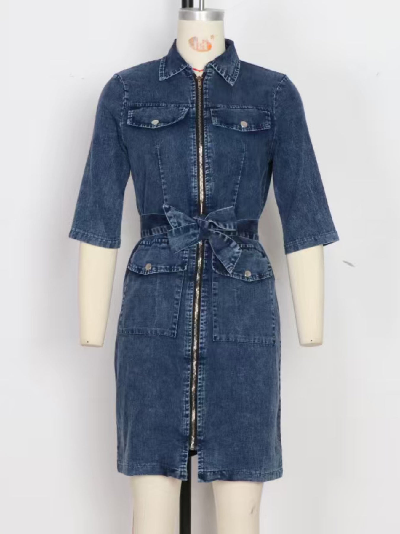 Grey zipper front short sleeve denim dress by Trendsi, featuring a fitted silhouette and classic denim material.