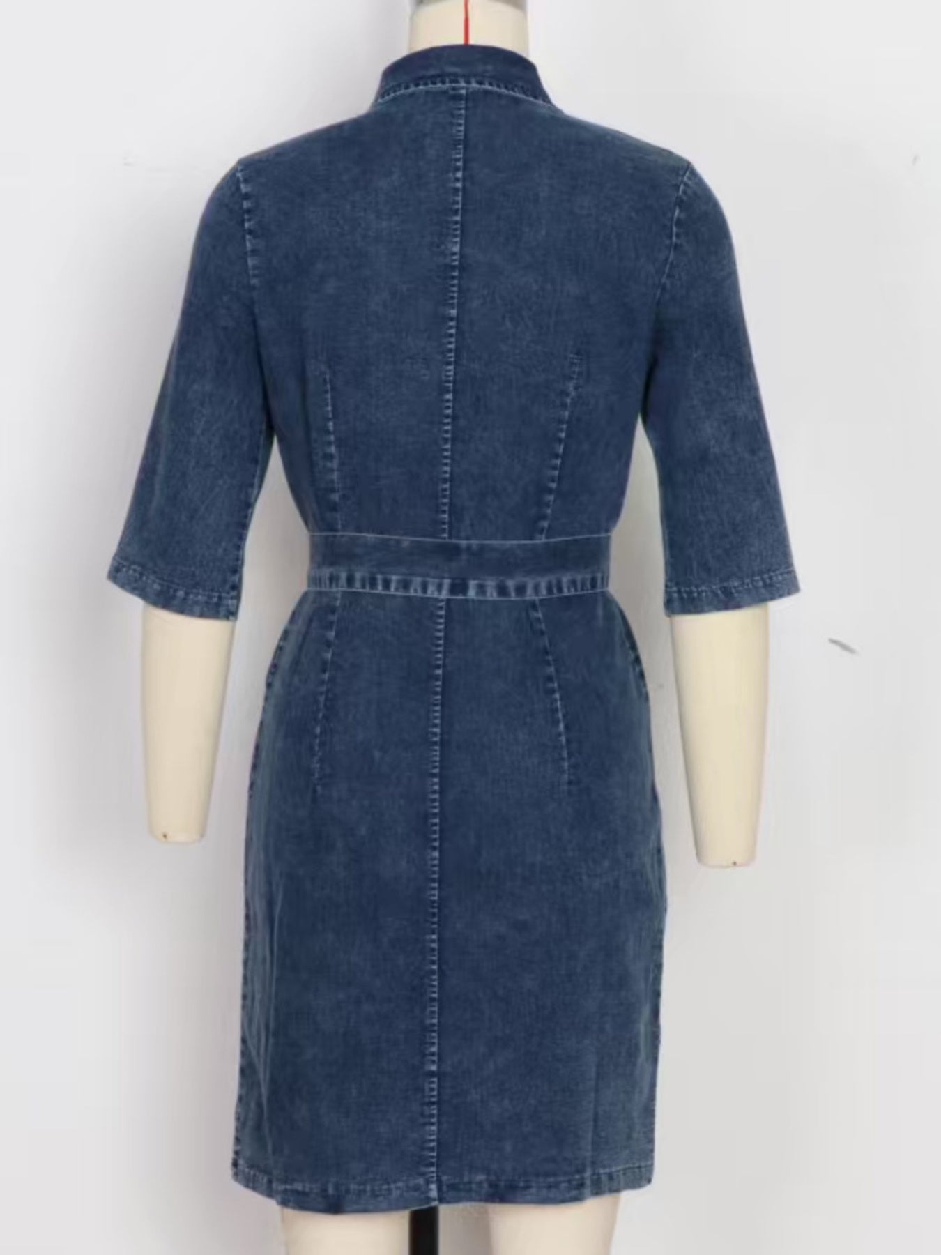 Grey zipper front short sleeve denim dress by Trendsi, styled with a fitted silhouette and classic denim texture.