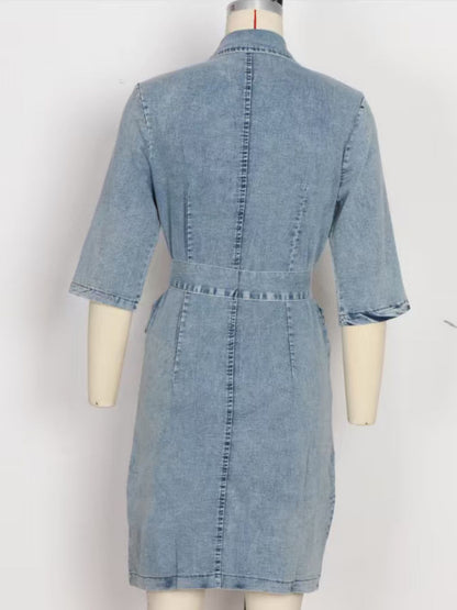 Grey zipper front short sleeve denim dress by Trendsi, showcasing a casual fit with a front zipper detail and short sleeves.