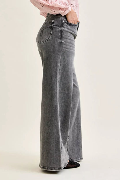 Gray Judy Blue mid-rise palazzo pants with split back yoke, showcasing comfortable wide-leg design and stylish detailing.