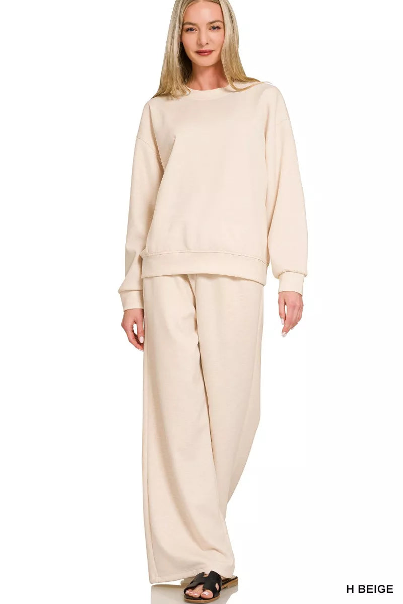 Zenana scuba crewneck pullover and pants set in soft fabric, shown laid out with the top and matching pants visible.