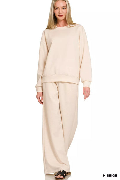 Zenana scuba crewneck pullover and pants set in soft fabric, shown laid out with the top and matching pants visible.