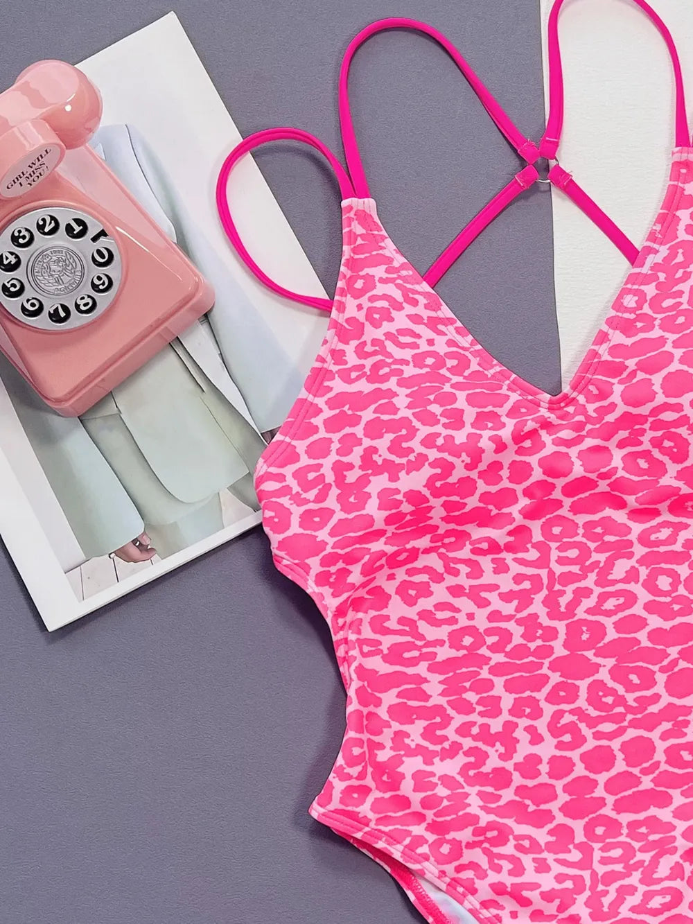 Hot pink leopard plunge swimwear by Trendsi, stylish one-piece swimsuit perfect for beach glam and summer fun.