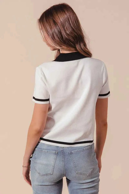 Ivory and black SO ME button-down knitted sweater shirt top by Trendsi, featuring a cozy, stylish knit design.