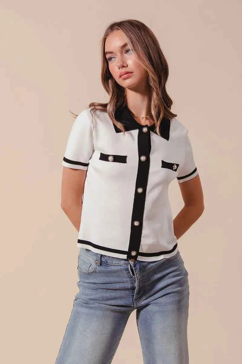 Ivory and black SO ME button-down knitted sweater shirt top by Trendsi, featuring a cozy, stylish button-up design.