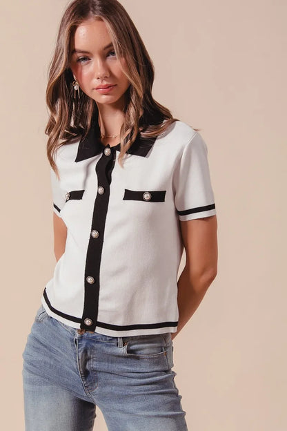 Ivory and black SO ME button-down knitted sweater shirt top by Trendsi, featuring a cozy, classic design with a button front.