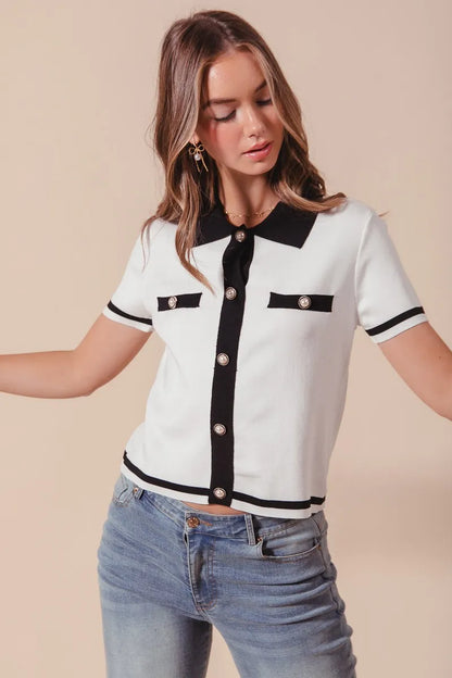 Ivory and black SO ME button-down knitted sweater shirt top by Trendsi, featuring a classic collar and cozy knit fabric.