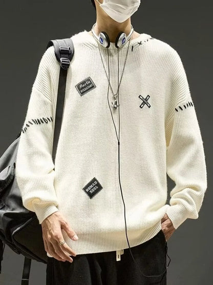 Men's ivory dropped shoulder long sleeve sweater by Trendsi, featuring a relaxed fit and soft knit fabric.