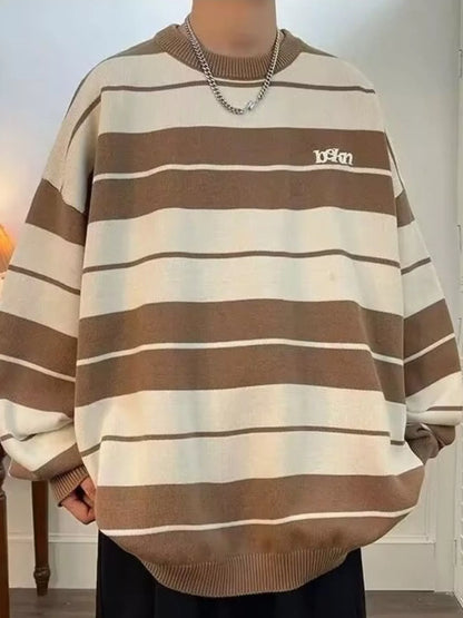 Men's ivory dropped shoulder long sleeve sweater by Trendsi, featuring a relaxed fit and ribbed cuffs.