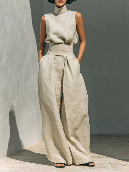 Sleeveless turtleneck top and matching pants set by Trendsi, featuring a sleek, fitted design in neutral fabric.