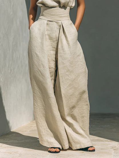 Sleeveless turtleneck top and matching pants set from Trendsi, stylish and comfortable for casual wear.