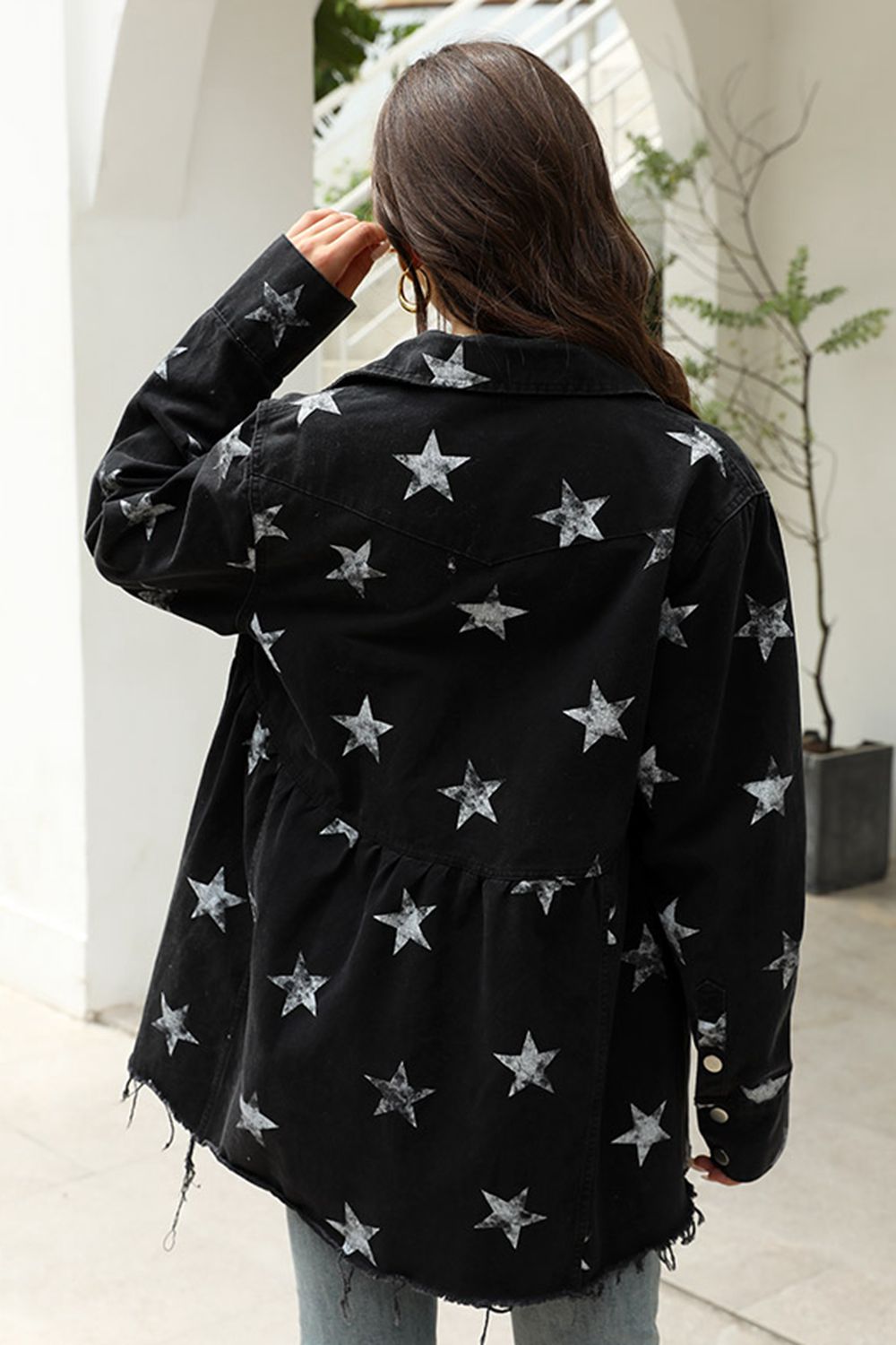 Black denim jacket with a collared neck and star print long sleeves, stylish trendy jacket from Trendsi.
