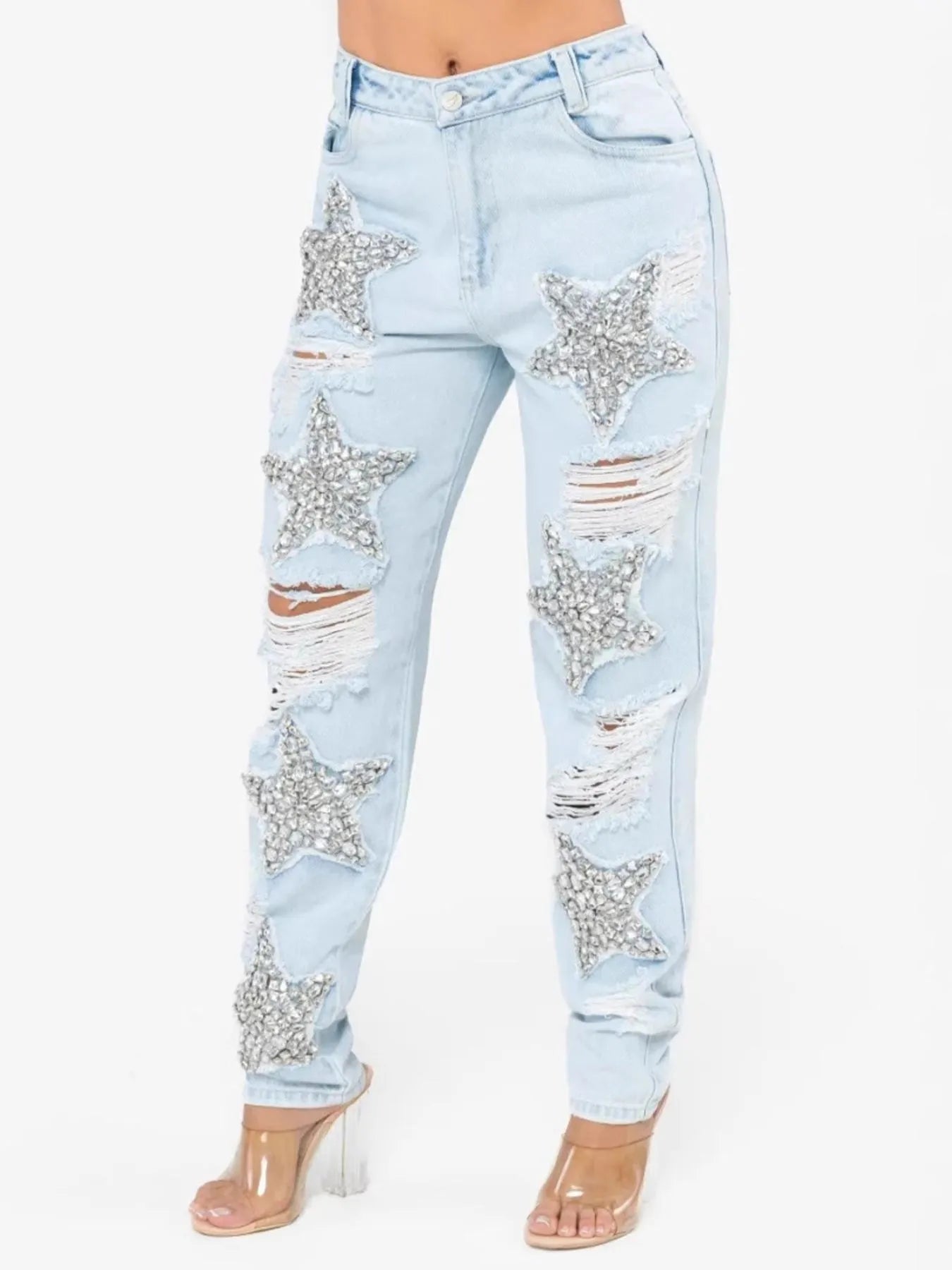 Blue distressed star wash boyfriend jeans from Trendsi featuring a relaxed fit and trendy design.