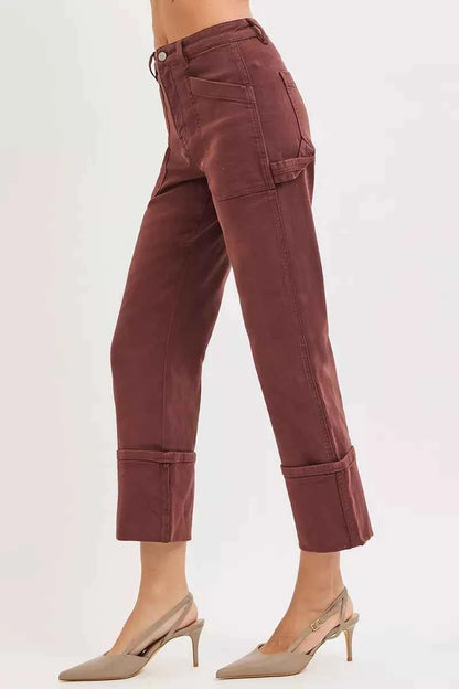 Plus size RISEN high-rise wide straight cuffed jeans by Trendsi, showing the fit and cuffed style on a model.